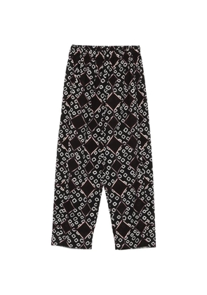 YAVI Triya geometric-pattern trousers - Black