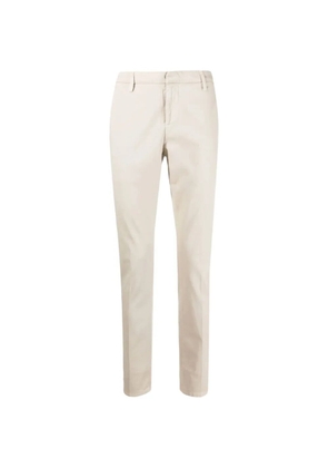 DONDUP logo-plaque pressed-crease trousers - Neutrals