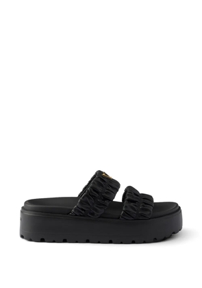 Prada Matelassé nappa leather flatform slides - Black