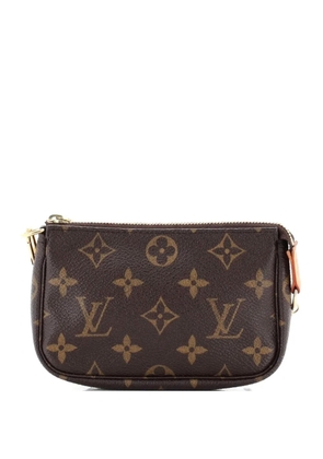 Louis Vuitton Pre-Owned Pochette Accessoires Monogram Canvas Mini clutch bag - Brown
