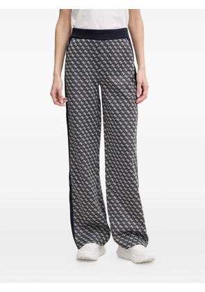 GUESS USA 4G-print side-stripe track pants - Blue