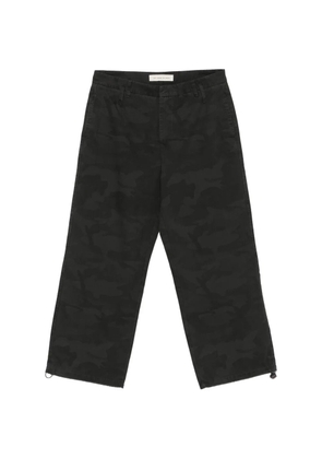 STAY HUMAN ON EARTH camouflage-pattern trousers - Black