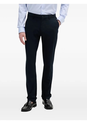 Tommy Hilfiger logo-patch trousers - Blue