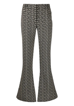 Balmain low-rise monogram bootcut trousers - Black