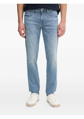 GUESS USA logo patch denim jeans - Blue