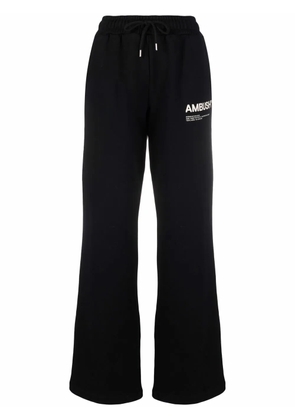 AMBUSH logo-print fleece track pants - Black