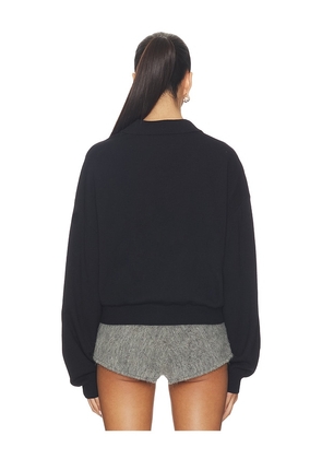 ROTATE Slinky Knit Polo in Black. Size S. Also in XS, M, L, XL.