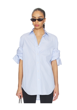 Monse Knotted Sleeve Shirt in Baby Blue,White. Size 4. Also in 0, 2, 6, 8.