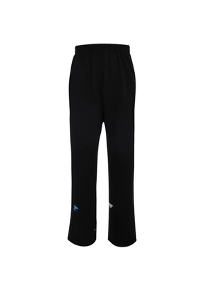 Tee Library graphic-print track pants - Black