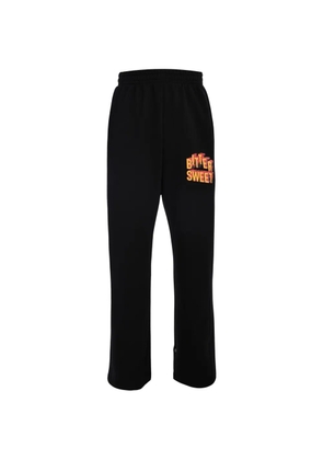Tee Library Bittersweet graphic-print track pants - Black