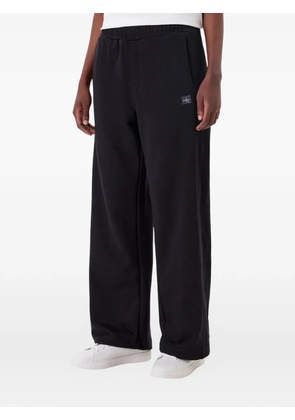 Calvin Klein logo-patch wide-leg track pants - Black