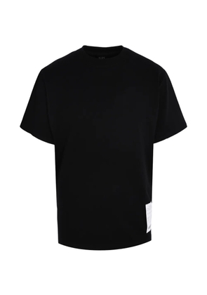 Tee Library Rip-off logo-patch t-shirt - Black