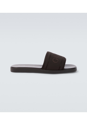 Gucci Logo canvas and leather slides