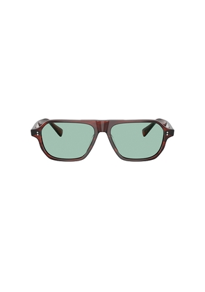 Oliver Peoples Remment Irregular Sunglasses in Brown.