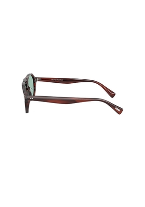 Oliver Peoples Remment Irregular Sunglasses in Brown.