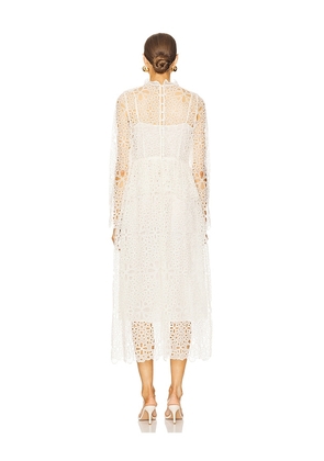 Sea Lumi Eyelet Peplum Long Sleeve Dress in White. Size 00. Also in 2, 0, 4.