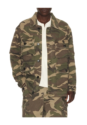 Found Camouflage Twill Utility Cargo Jacket in Green. Size M. Also in S, L, XL/1X, XXL/2X.