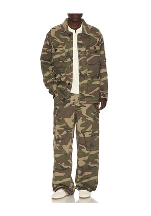 Found Camouflage Twill Utility Cargo Jacket in Green. Size M. Also in S, L, XL/1X, XXL/2X.