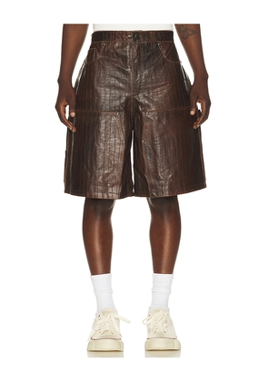 Found Distressed Croc Embossed Leather Shorts in Brown. Size 30. Also in 31, 32, 34.