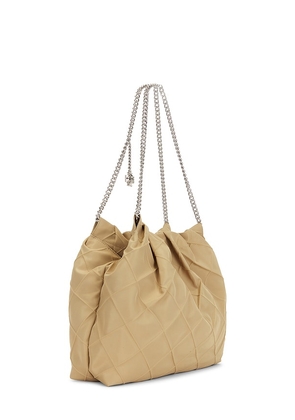 Tory Burch Fleming Nylon Hobo Bag in Tan.