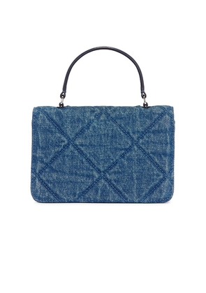 Tory Burch Kira Diamond Quilt Denim Mini Top Handle Chain Wallet in Blue.