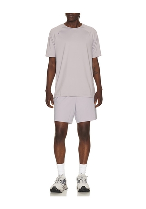 Rhone 7 Pursuit Unlined Shorts in Purple. Size S. Also in M, XL/1X, XXL/2X.