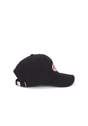 VERUTUM Initial Cap in Black.