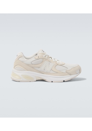 Comme des Garcons Homme x New Balance 2010 leather-trimmed sneakers