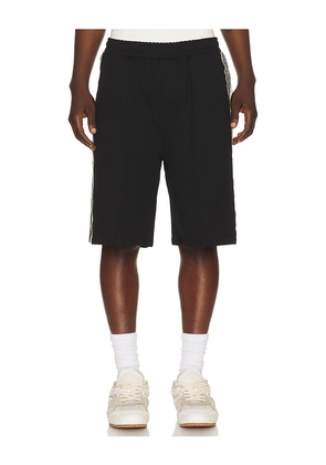 Jungles Knit Panel Shorts in Black. Size L. Also in M, S, XL/1X.