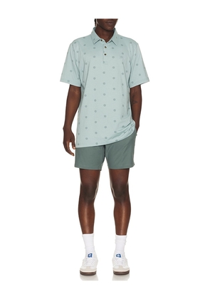 TravisMathew Performance Jersey Polo in Blue. Size L. Also in S, M, XL/1X.