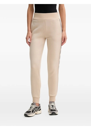 GUESS USA logo-print track pants - Neutrals