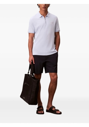 Calvin Klein zip-fastening logo-patch polo shirt - Blue