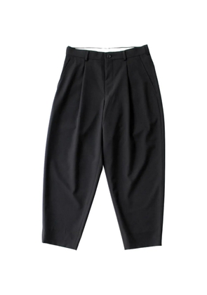 Comme des Garçons Homme Deux pleated tapered-leg trousers - Black