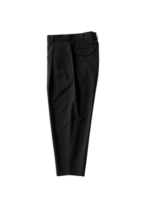 Comme des Garçons Homme Deux pleated tapered-leg trousers - Black