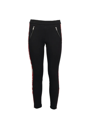 Alexander McQueen Pre-Owned floral-tape track pants - Black