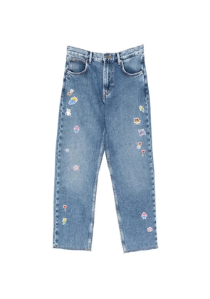 Mira Mikati sticker-patch jeans - Blue