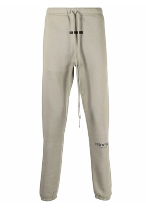 FEAR OF GOD ESSENTIALS logo-print track pants - Green