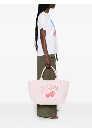GANNI logo-patch raspberry-print tote bag - Pink
