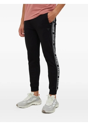 GUESS USA logo-tape track pants - Black