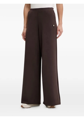 GUESS USA logo-plaque palazzo pants - Brown
