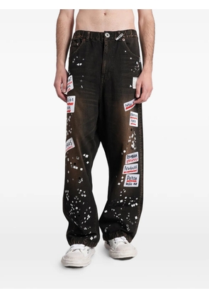 Maison MIHARA YASUHIRO patch-detail stud-embellished jeans - Black