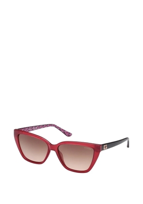 GUESS EYEWEAR cat-eye frame sunglasses - Red