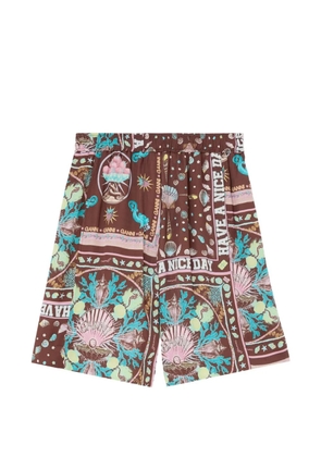 GANNI graphic-print shorts - Brown