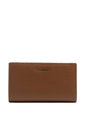 Coccinelle logo-lettering pebbled-leather wallet - Brown