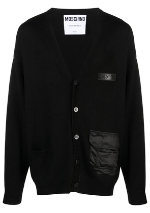 Moschino logo-embossed ribbed-knit cardigan - Black