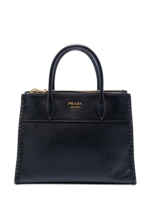 Prada Pre-Owned 2010-2026 City Calf Trimmed Saffiano Paradigme Whipstitch satchel - Black