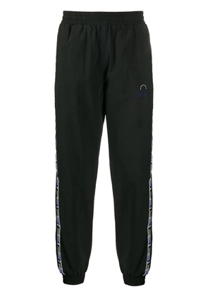 Études Studio logo track trousers - Black