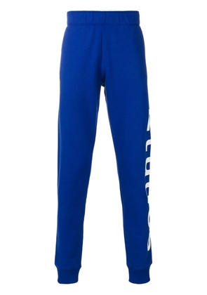 Études Studio logo print track trousers - Blue