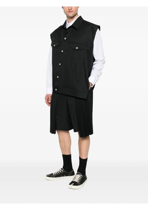 Black Comme Des Garçons pleated shorts