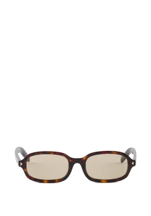 Prada Eyewear sunglasses with the iconic metal plaque - Brown